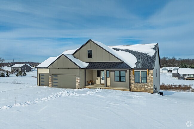 Caledonia Township ranch-style homes feature modern finishes and attached garages.