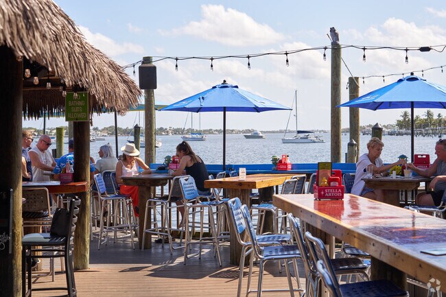 Dine on the water at the Old Key Lime house in Lantana, ten minutes from High Ridge.