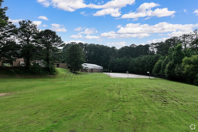 Spacious green recreational areas are available for students of Oliver Elementary.