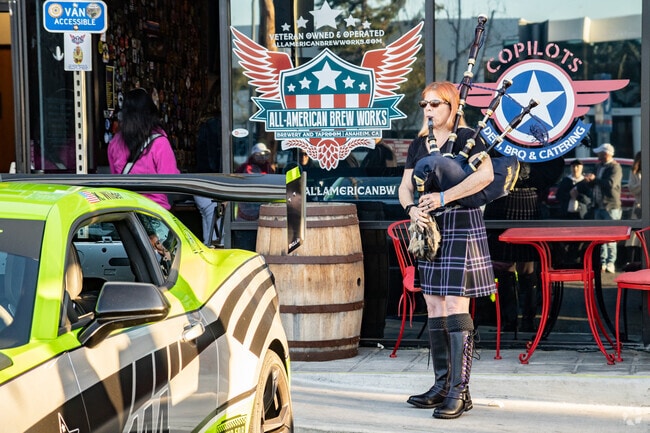 Surprise guests like race car drivers and bagpipe performers come to Drag'n Knights Car Show.