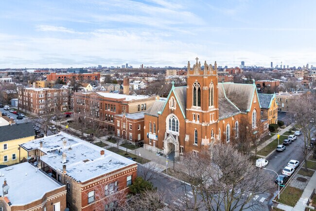 Acero Charter Carlos-Fuentes Campus is located adjacent to St Francis Xavier Church.