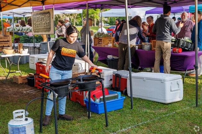 Fresh vegetables being sautéed permeates the air at a local farmer's market near Killearn Lakes
