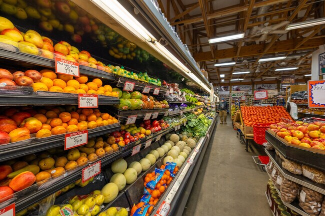 Colorful produce fills the aisles at Game’s Farmers Market in Newport News.
