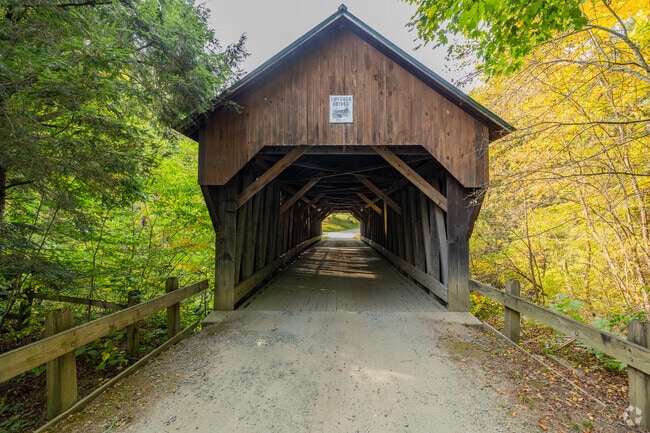 In Cornish Colony, covered bridges offer a glimpse into the past with their rustic beauty.