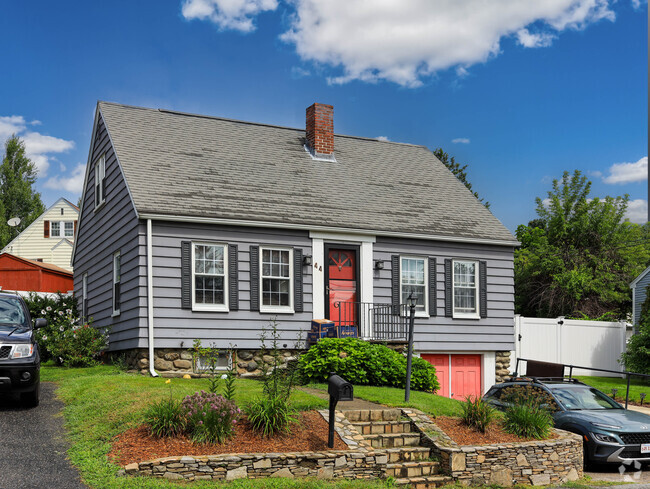 Some South Quinsigamond Village capes sit high up on the street.