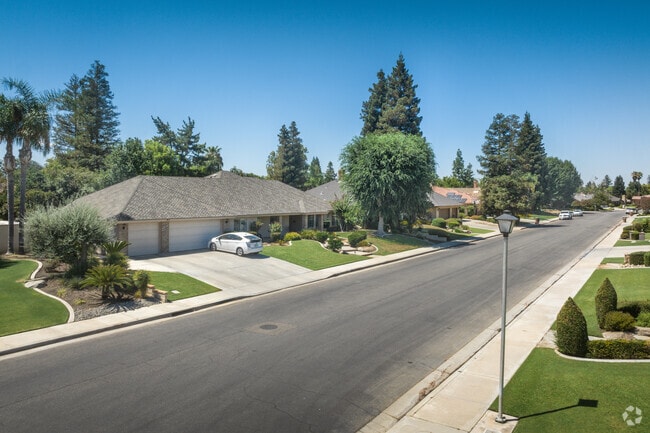Haggin Oaks features many large single-story homes with well-manicured landscapes.