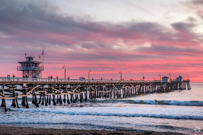 A stunning sunset glows over the San Clemente Pier near Southeast San Clemente.