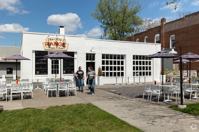 Savor burgers & brews on Shaw's sunny patio at Bailey's Range.