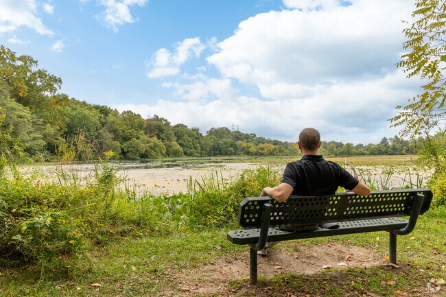Benches along the marsh offer relaxation at John A Roebling Park.