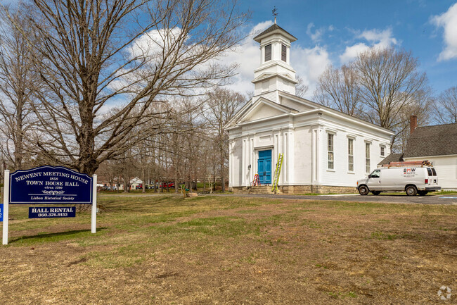 At the center of the town of Lisbon sits the Newent Congregational Church, a historical church in the area.