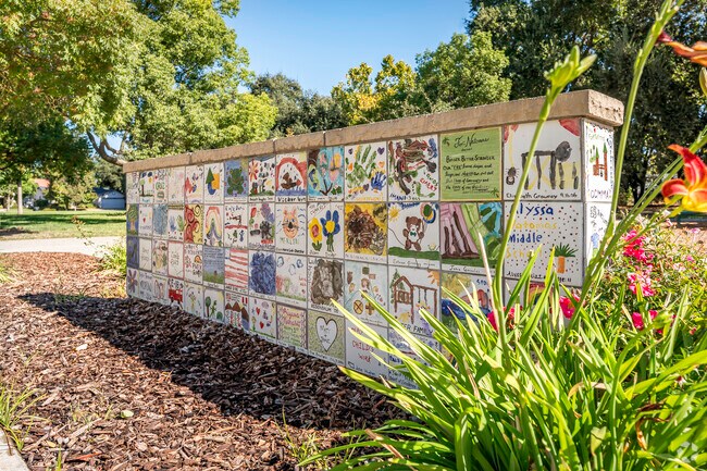 This wall of young artist’s tiles decorates the neighborhood of Frates Ranch.
