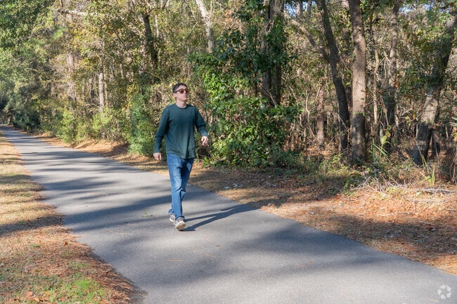 The neighborhood has several walking trails for easy access to parks and amenities.