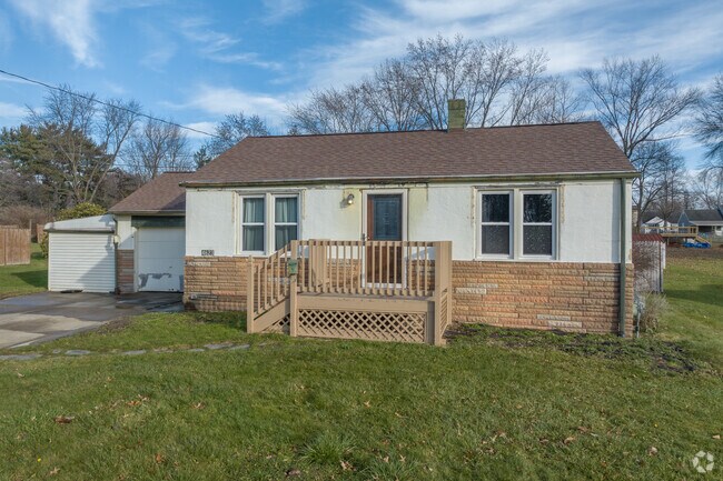Ranch-style home with a tidy lawn in Churchill.