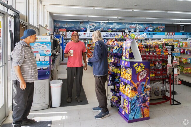 North Edwards friends run into each other at the Sunshine Market.