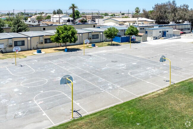 There are basketball courts at Arthur E. Mills Intermediate School in Firebaugh.