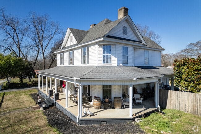 A few large farmhouse style homes can be found in Woodruff, SC.