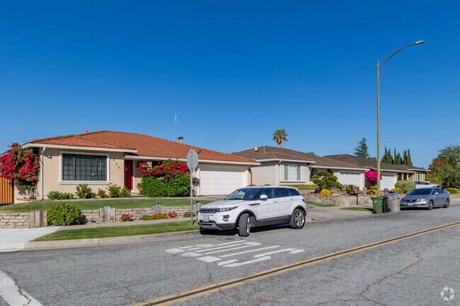 Many of the homes in Penitencia have attached garages and big windows.