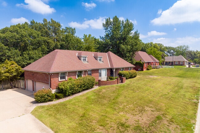 Three car garages are often tucked under the main home in Sheraton Estates.