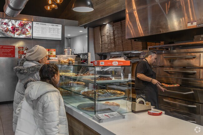 Enjoy classic Italian dishes and a cozy vibe at Gino’s Parlor in Sandy Hook.