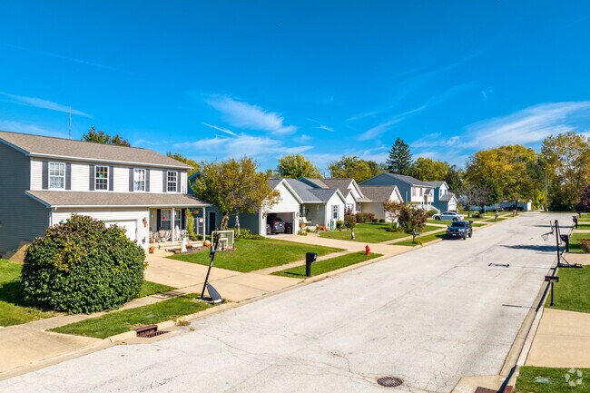 The streets of Creve Coeur, IL are lined with one or two-story level homes of various styles.