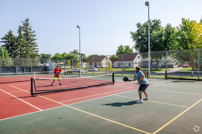Residents enjoy the pickle-ball courts at Tintes Park in West Fargo.
