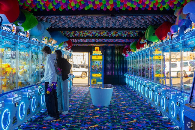 Enjoy hours of fun under the cool neon lights at Claw City in Downtown Tigard.