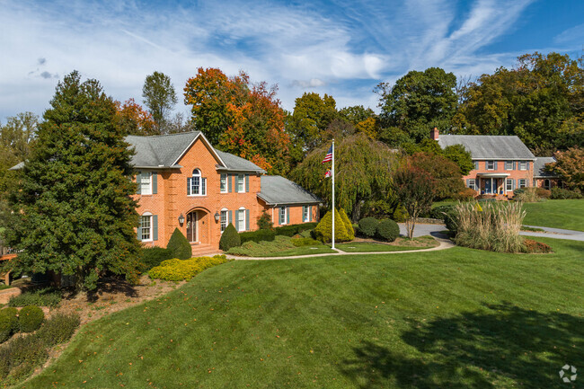 Discover stately brick colonials on massive lots in Holly Hills.