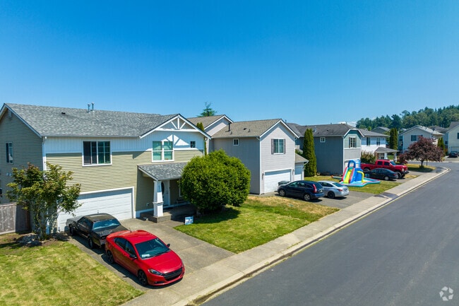 Frederickson homes feature short driveways and indoor garages.