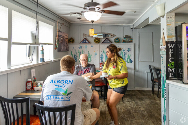 Gregory's Seafood Market & Restaurant is a popular dining spot located in Manchester, New Jersey, near the Pine Lake Park area.