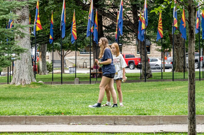 Prescott residents and tourists love to cool off in the shade at the park of the court house.