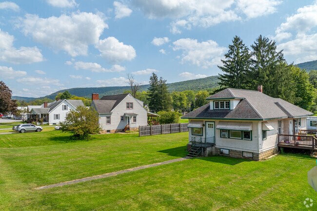 Bungalow style homes in Boggs Township come with attached decks to enjoy a family BBQ.