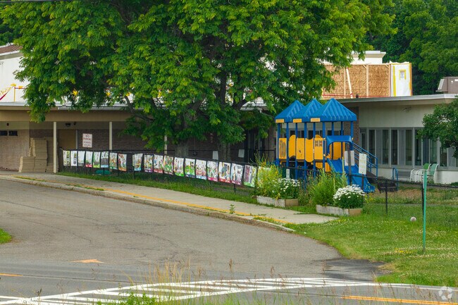 Enfield School has multiple playgrounds.