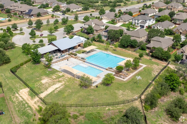 The Fronterra at Westpointe amenities center offers a refreshing pool, fun play areas, and spots to relax and connect with neighbors.