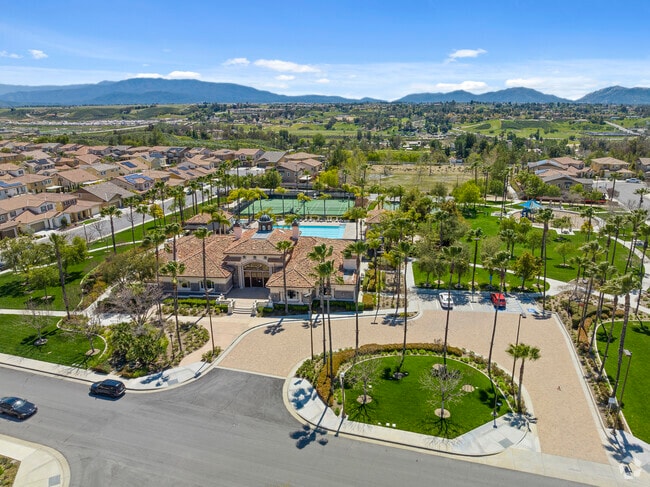 Grand Aerial View Showcases Inviting Entrance Of Roripaugh Ranch Hoa Neighborhood.