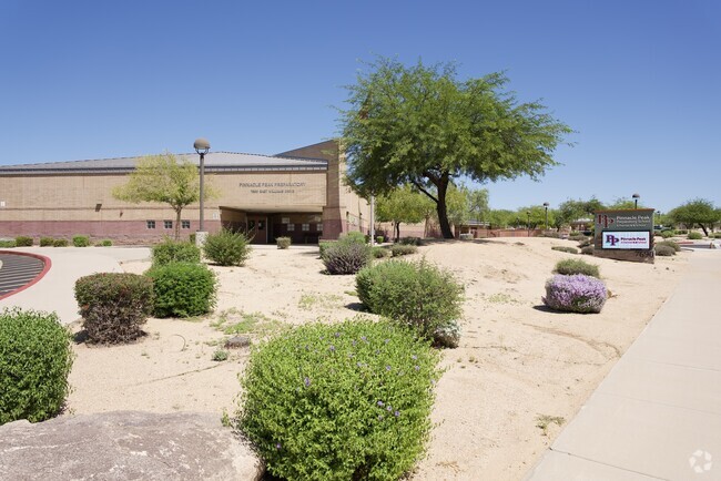 Front of school and signage