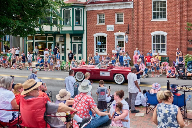 Spectators enjoy the 4th of July parade as it makes it's way through Shepherdstown.