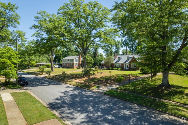 Many homes are surrounded by tall trees and vegetation in Park Hills.
