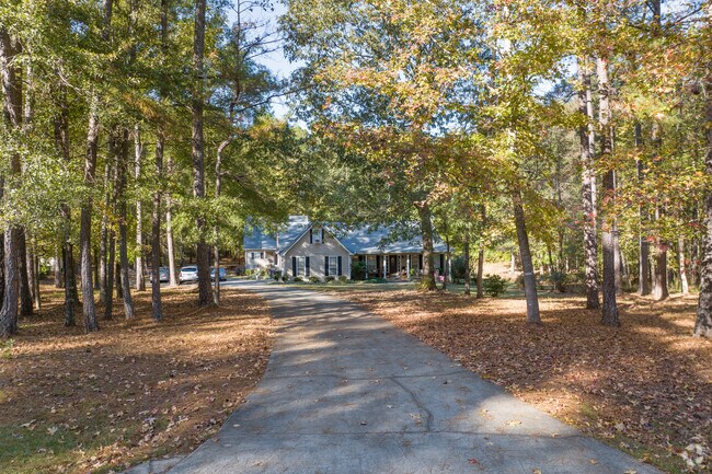 Extended driveways are common for Brooks properties on spacious acreage.