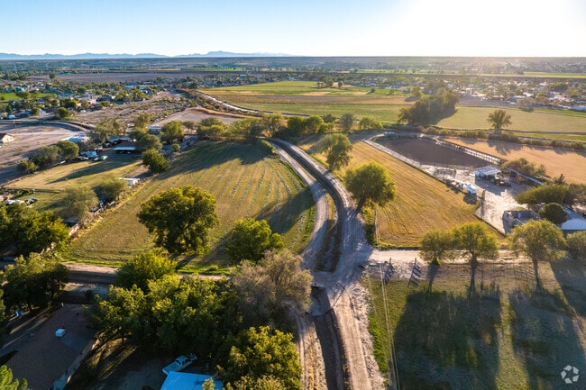 Breathe in the serenity of San Elizario embraced by hay fields.