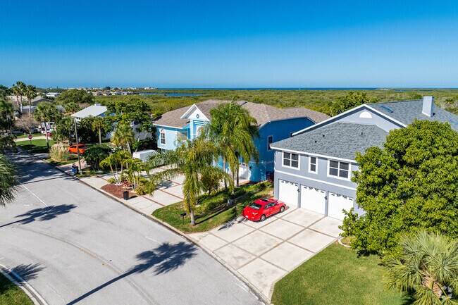 Newer custom homes can have 3 car garages and a dock in the backyard in New Port Richey West.