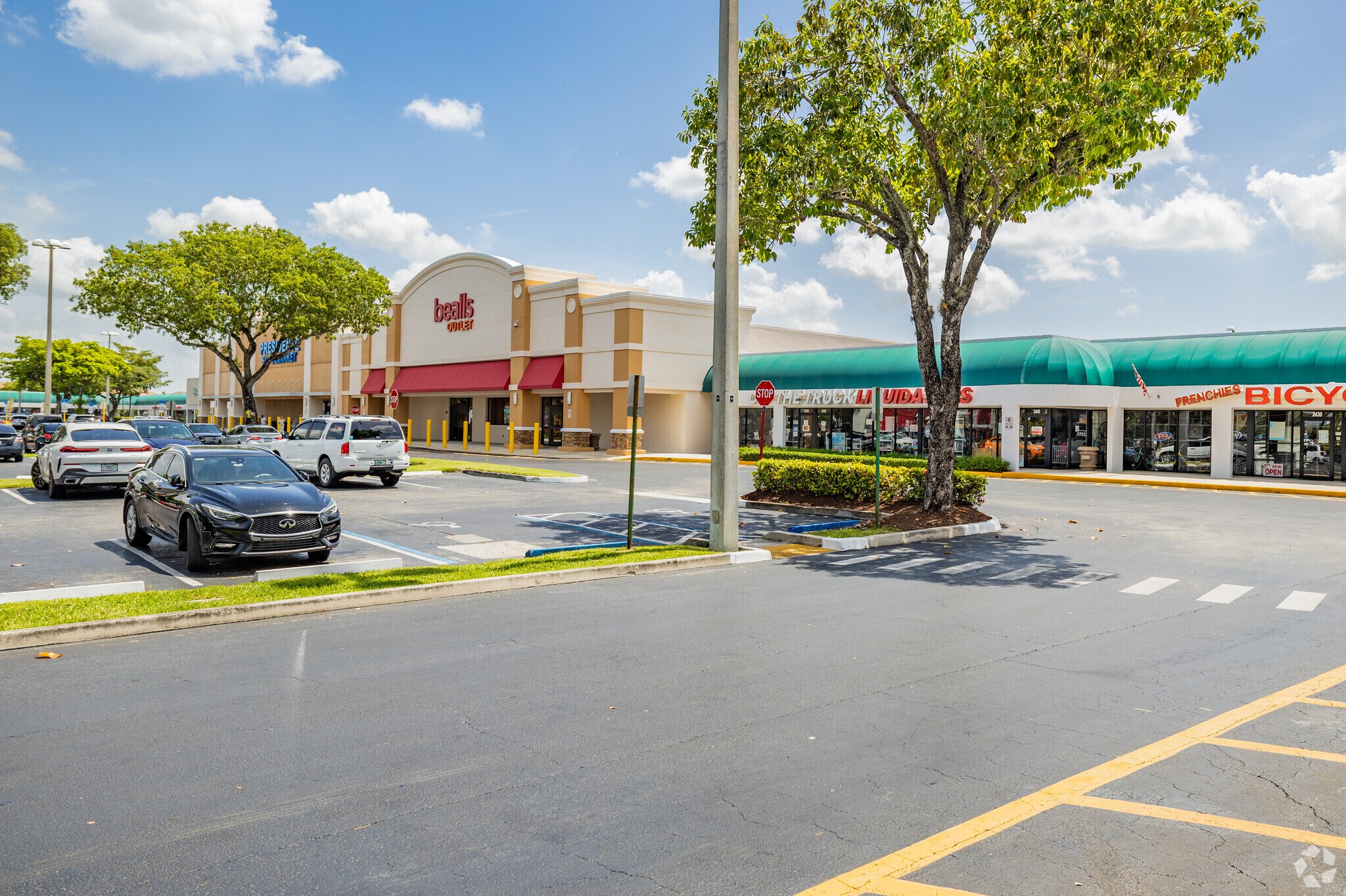Shop clothes and groceries at the Margate Shopping Center in Margate Gardens, Florida.