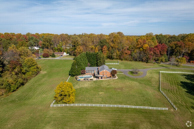 This lawn farm has a swimming pool.