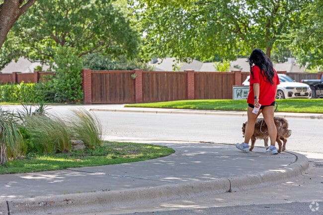 Take your dog for a walk around the neighborhood of Kings Gate.