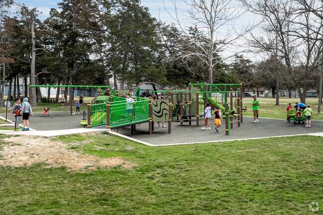 Kids can climb on the playground at Peter Pan Park in Emporia.