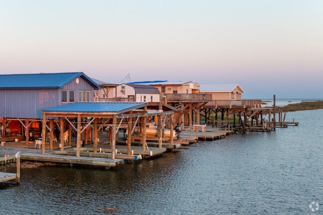 Charming homes on sit on stilts along the bayou of Montegut.