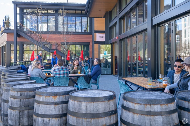 Enjoy a beer by the barrels with your friends at Lamplighter Brewery in East Cambridge.