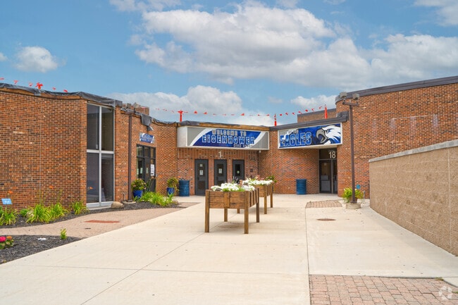 The front entrance to Eisenhower High School in Shelby Township, MI, has raised planters.