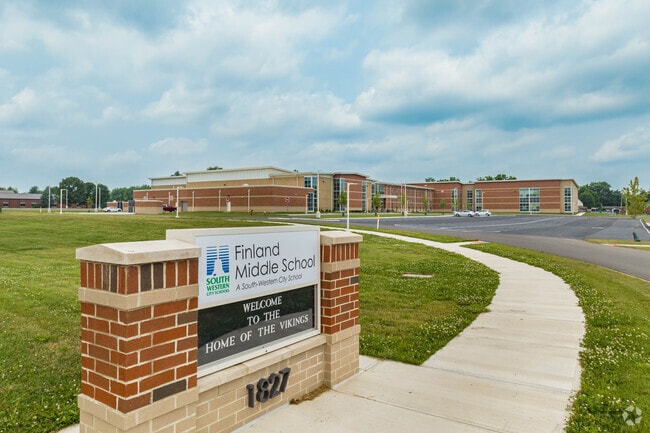 This is the front of Finland Middle School in Outer Greater Hilltop.