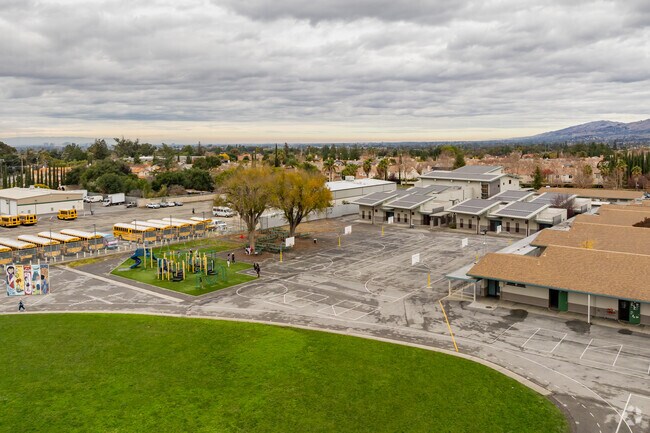 Evergreen Elementary School students have fun on the playground at recess.