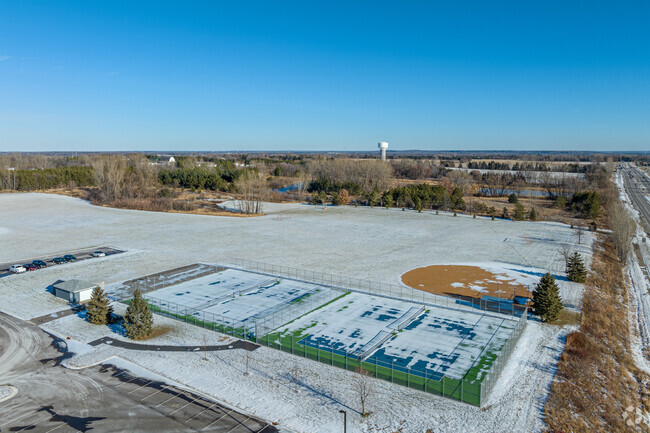 There are athletic fields and tennis courts to the east of Skyview Middle School.